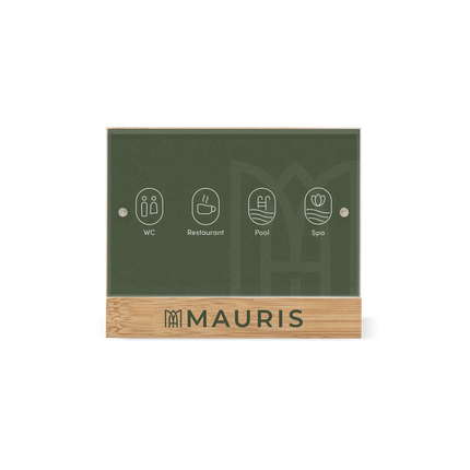 An information bamboo panel with icons for Wi-Fi, elevator, pool, and spa, with the brand name 'Mauris' at the bottom.