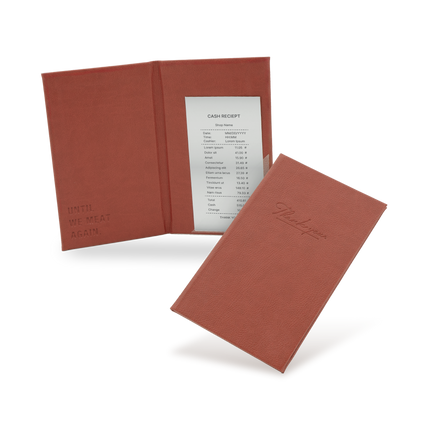 A brown bill binder with a menu partially visible, closed and open, with a visible logo on the front cover.