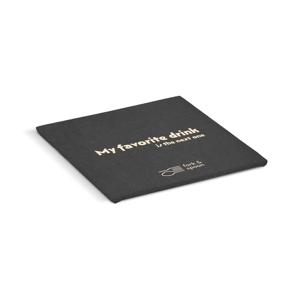 An black square coaster with the text 'My favorite drink' and a logo on it.