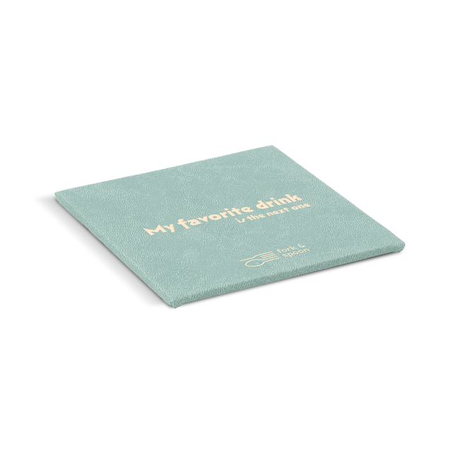 An blue square coaster with the text 'My favorite drink' and a logo on it.