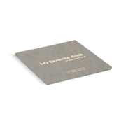 Grey coaster with text 'My favorite drink is the next one' on a white background
