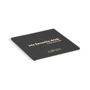 Black coaster with text 'My favorite drink is the next one' on a white background