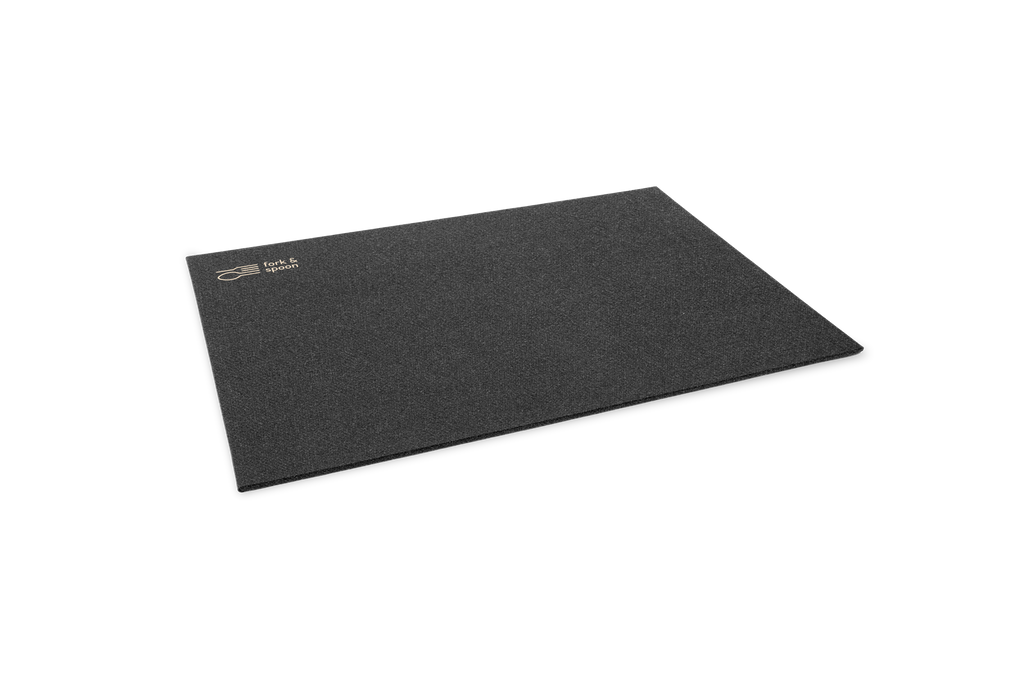 Black mat with a brand logo on a white background