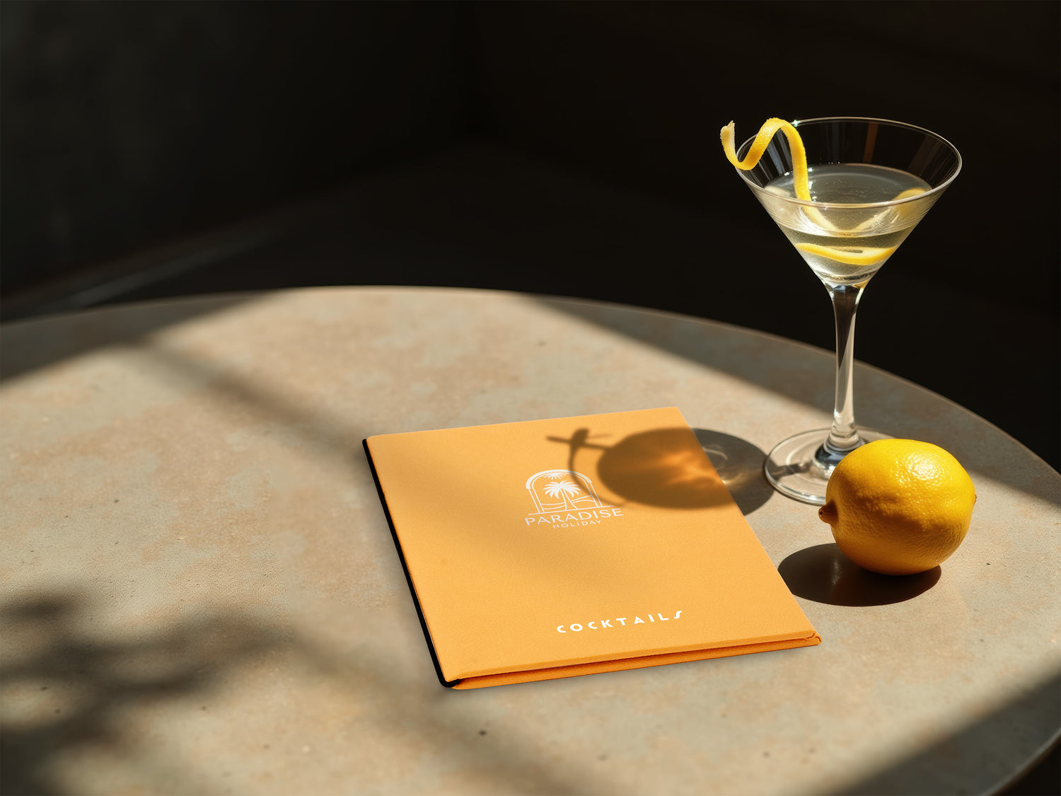 A orange menu for cocktails with a drink in a bar setting