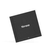 Black placemat with 'Menu' text on a white background