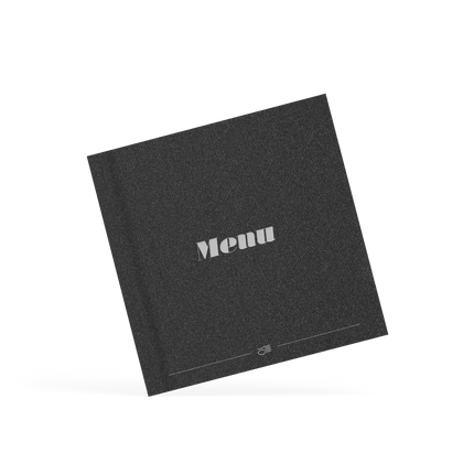 Black placemat with 'Menu' text on a white background