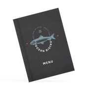 A classy clamp menu with a black cover featuring a white 'ocean bistro' logo.