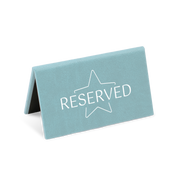 A blue reserved sign with a white star and the word 'RESERVED' printed on it.