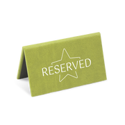 A green reserved sign with a white star and the word 'RESERVED' printed on it.