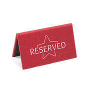 A red reserved sign with a white star and the word 'RESERVED' printed on it.