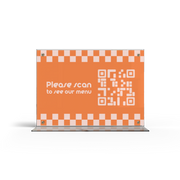 A acrylic menu stand with a transparent side showing a menu card inside.