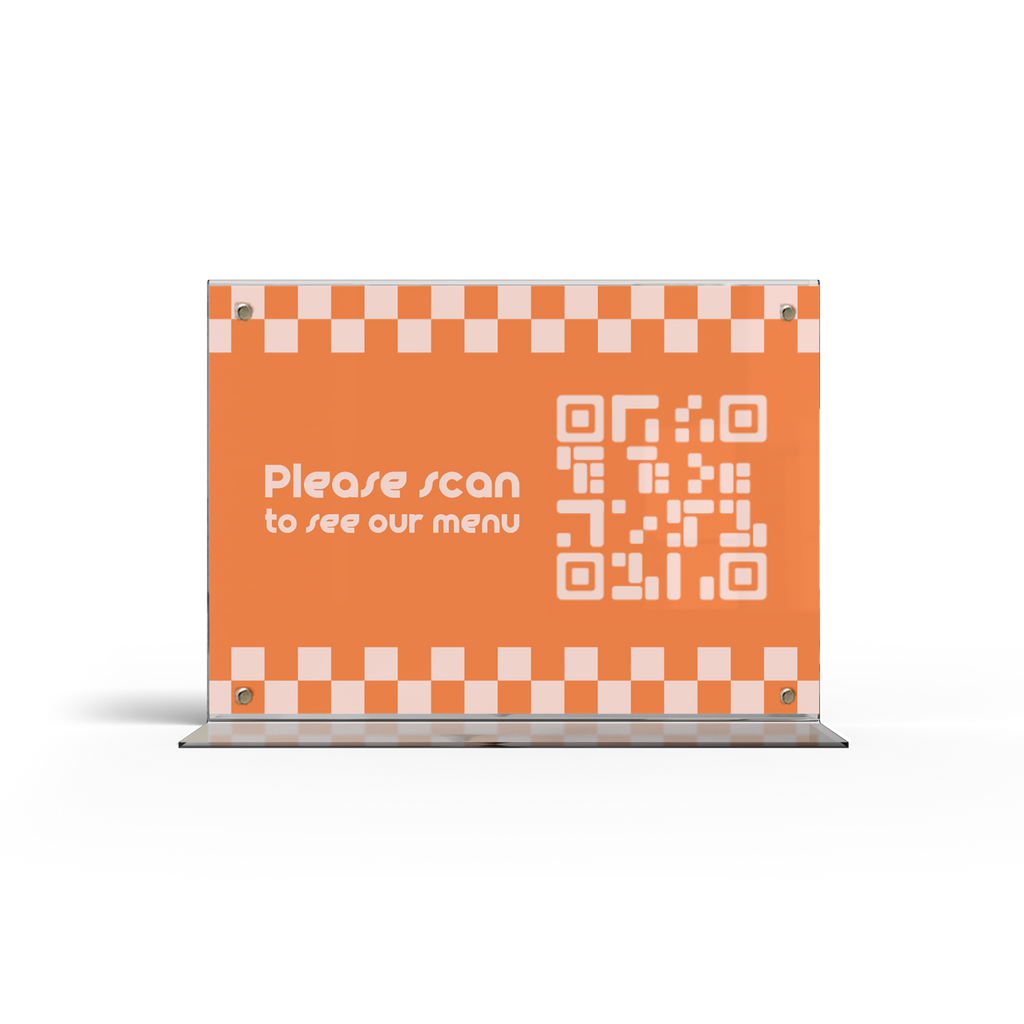 A acrylic menu stand with a transparent side showing a menu card inside.