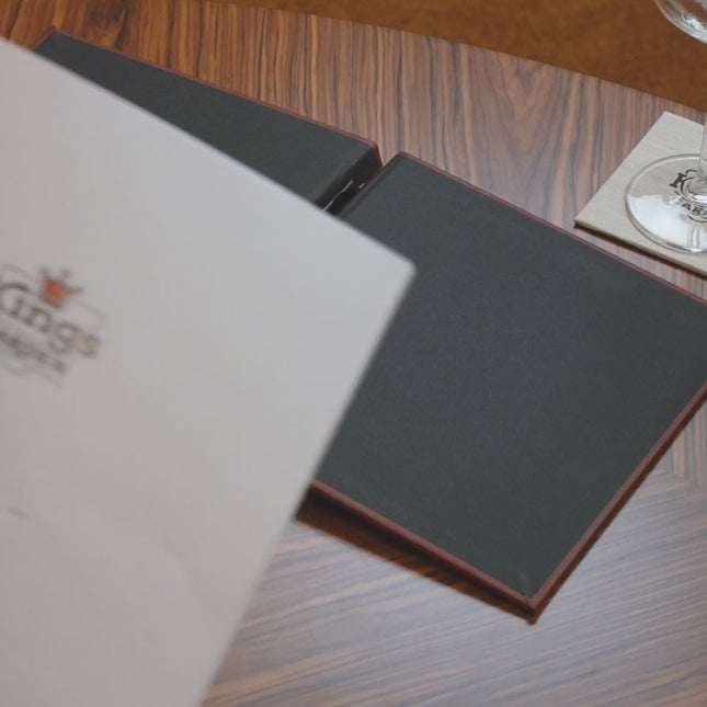 A video of a clamp menu cover with personalised logo