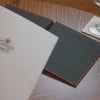 A video of a clamp menu cover with personalised logo